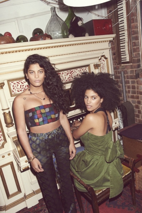 Naomi: Bandeau and Pants by Dries Van Noten; Lisa: Dress by Marc Jacobs
